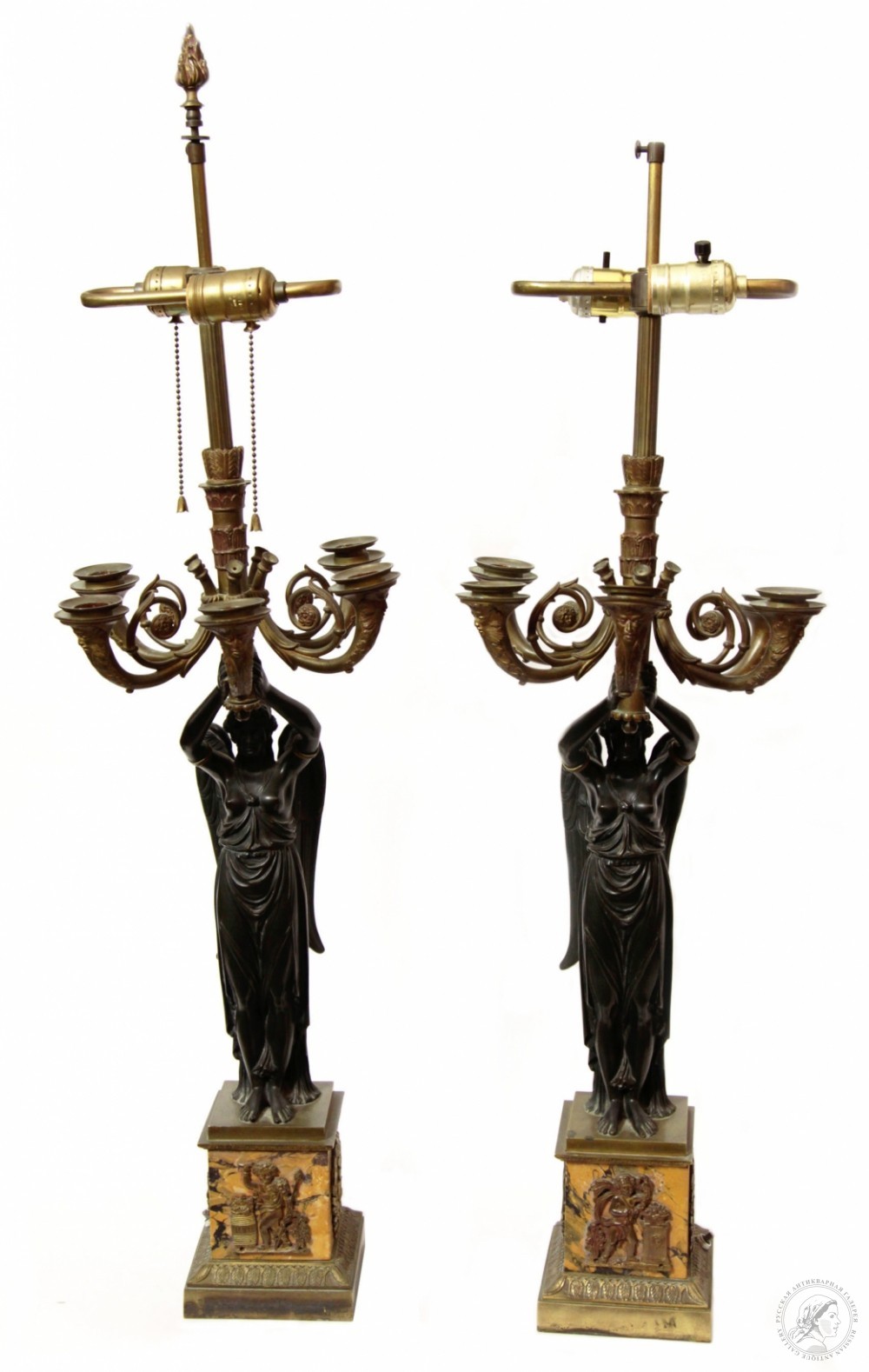 Парные канделябры на пять свечей с крылатыми патинированными фигурами «Ника» в стиле Ампир