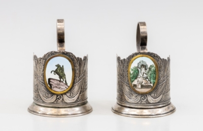Два подстаканника с эмалевыми медальонами «Медный всадник» и «Стерегущему»