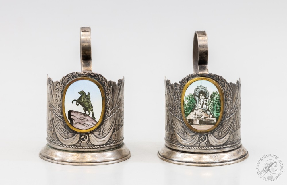Два подстаканника с эмалевыми медальонами «Медный всадник» и «Стерегущему»